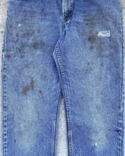 Load image into Gallery viewer, 1990s Levi&#39;s Stained and Distressed Orange Tab 506 - Size 35 x 32
