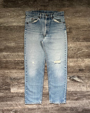 Load image into Gallery viewer, 1980s Levi&#39;s Distressed Light Wash Orange Tab 505 - Size 30 x 29
