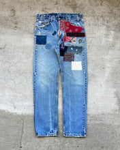 Load image into Gallery viewer, 1990s Levi&#39;s Hand Repaired and Patched Orange Tab 505 - Size 32 x 31
