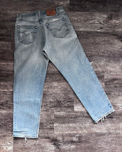 Load image into Gallery viewer, 1990s Levi&#39;s Light Wash Thrashed 550 - Size 34 x 31
