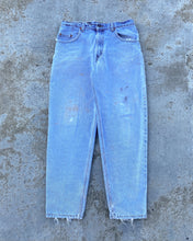 Load image into Gallery viewer, 1990s Levi&#39;s 560 Distressed Light Wash Jeans - Size 32 x 31
