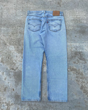 Load image into Gallery viewer, 1990s Levi&#39;s 501 Light Wash Blowout Jeans - Size 33 x 30
